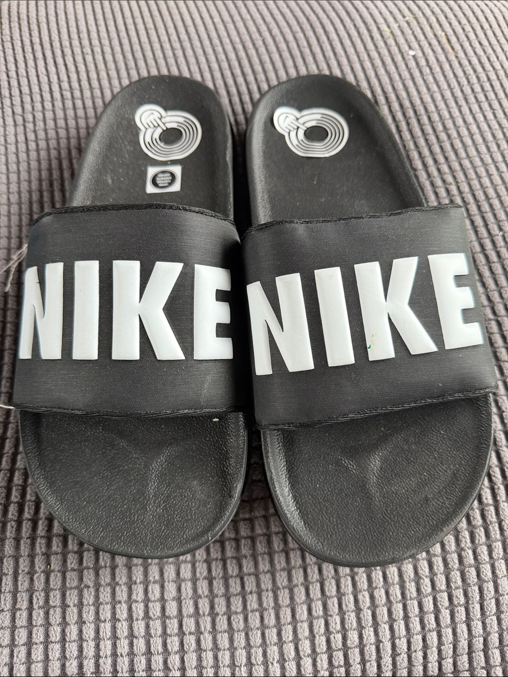 Nike Black Slides with Large White NIKE Logo